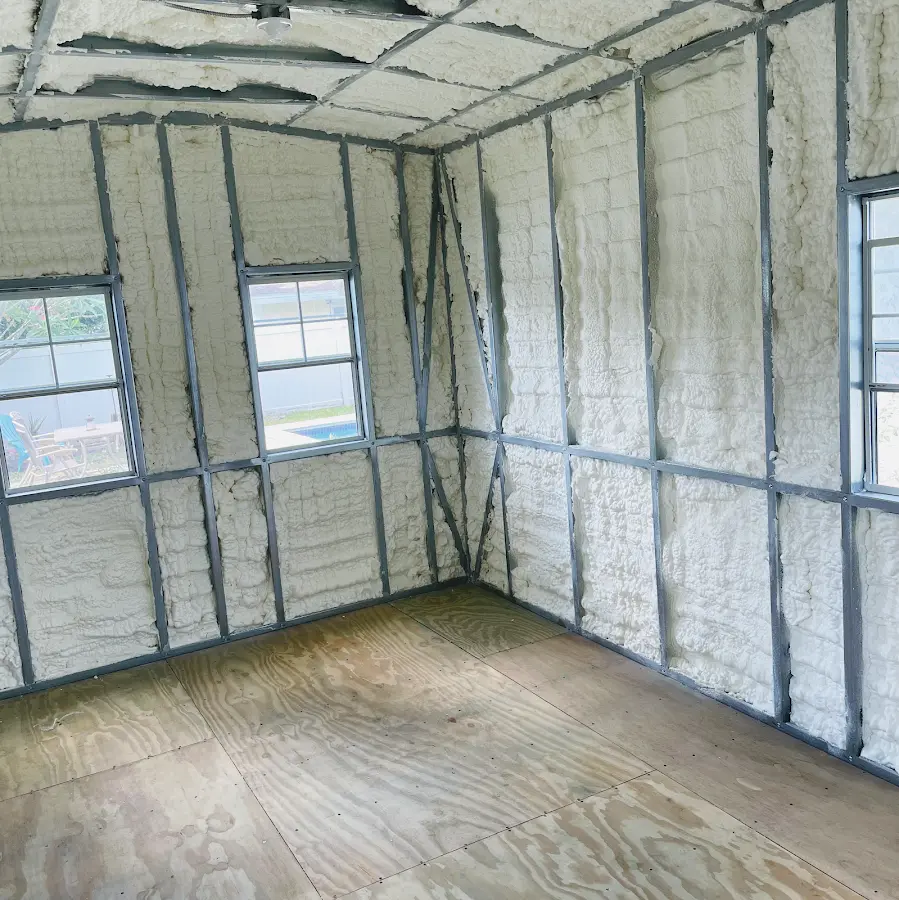 Closed-cell spray foam insulation applied to wall cavities in a residential project in West Orange